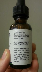Contents in a bottle of Mullein Garlic Oil